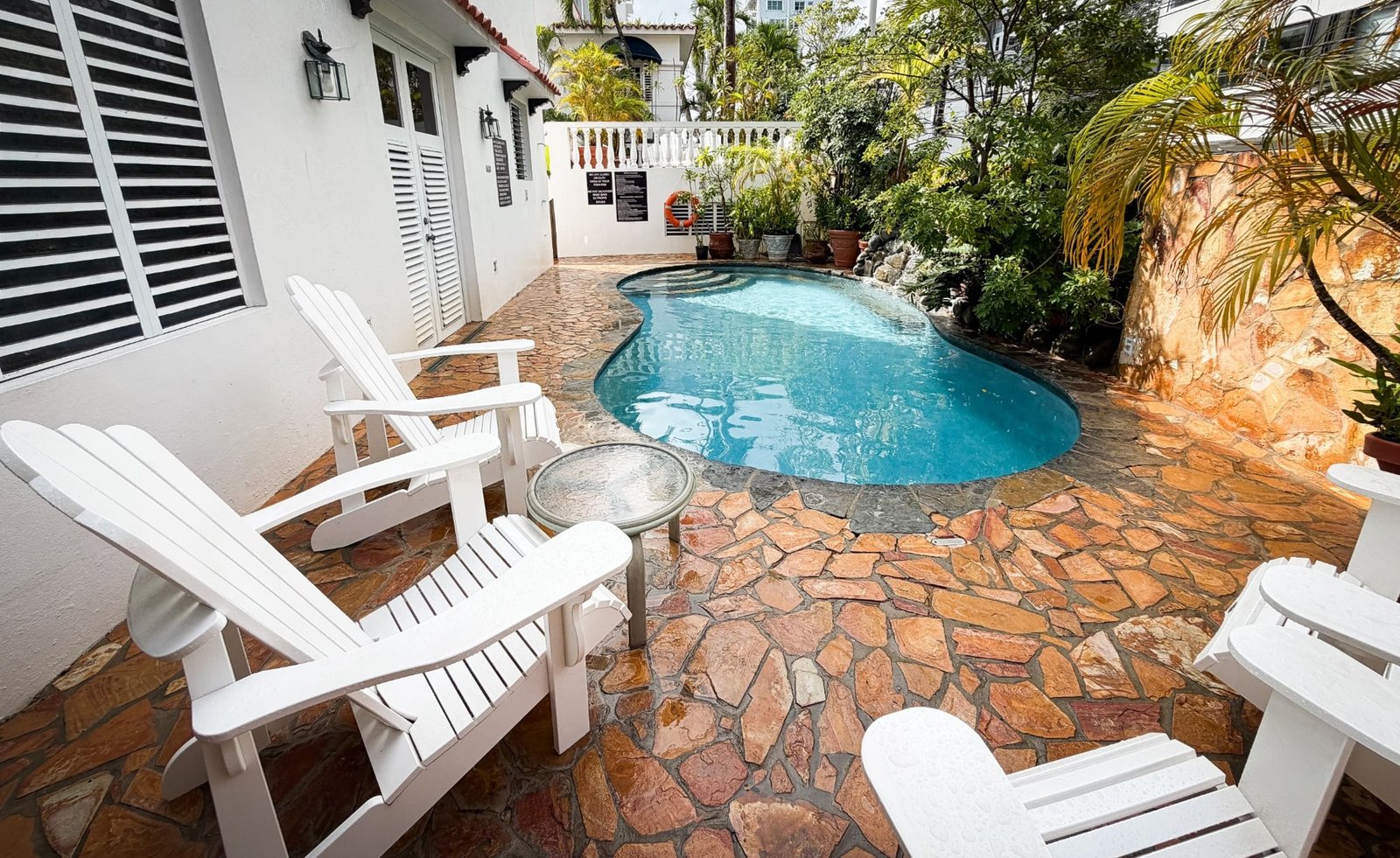 At Wind Chimes Boutique Hotel exterior showing the restored 1920s Colonial Spanish villa in Condado, San Juan