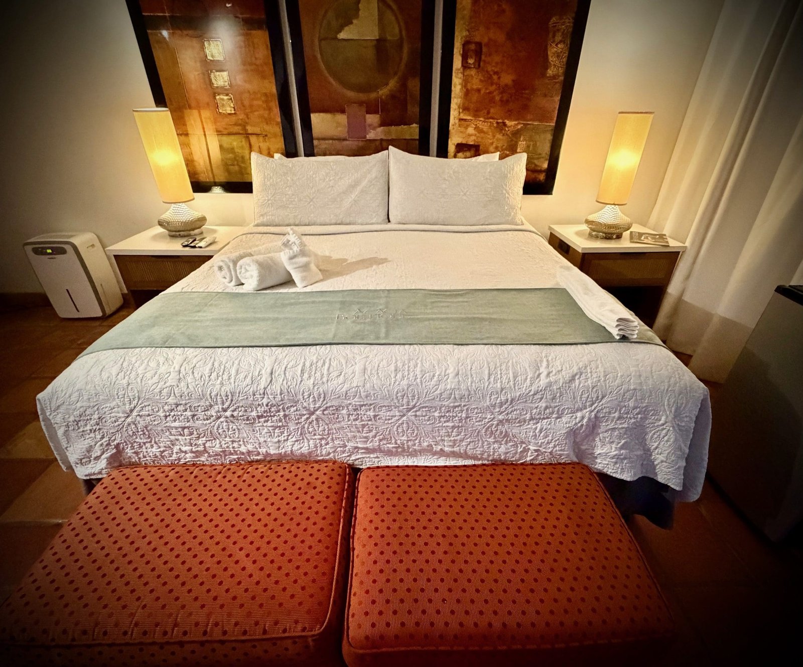 Deluxe King room at sister property in Condado — comfortable bedding and boutique styling for Puerto Rico Wine and Food Festival attendees